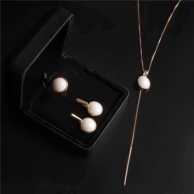 CONJUNTO FOLHEADO A OURO