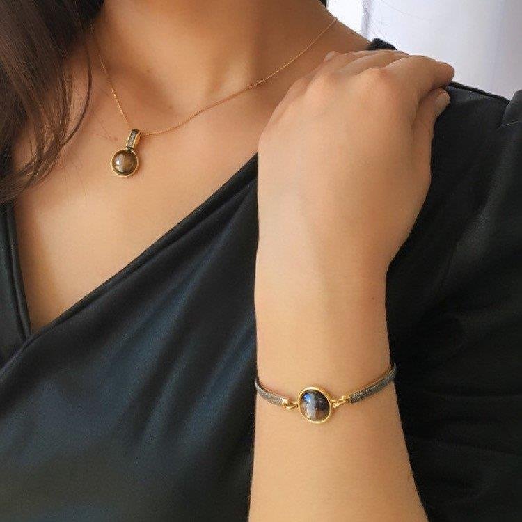 PULSEIRA FOLHEADO A OURO E RÓDIO NEGRO COM EFEITO PEROLADO